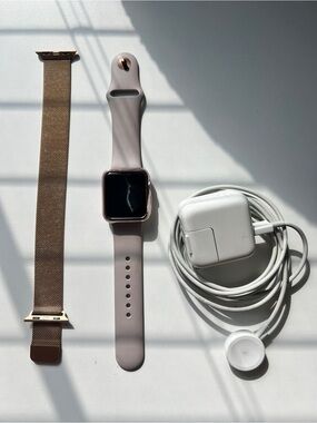 Apple Watch with Rose Gold Silicone Band and Charger